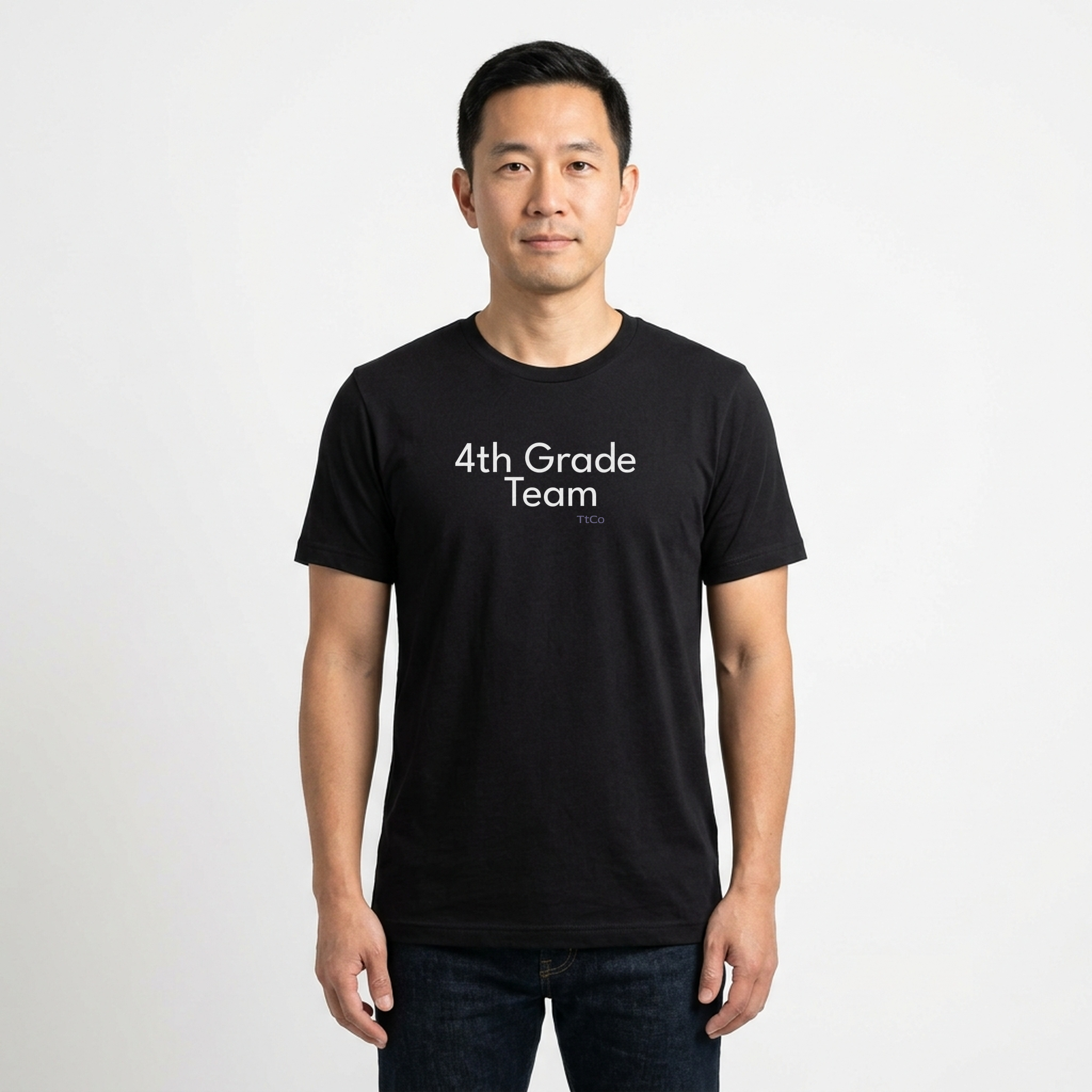 Kenji wearing the 4th Grade Team T-shirt from TtCo with the design centered on the front.