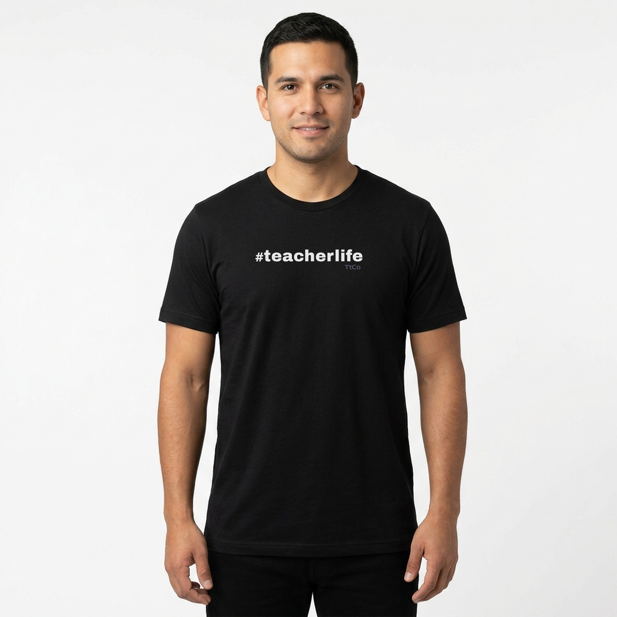 Luis wearing the #TeacherLife T-shirt from TtCo with the design centered on the front.
