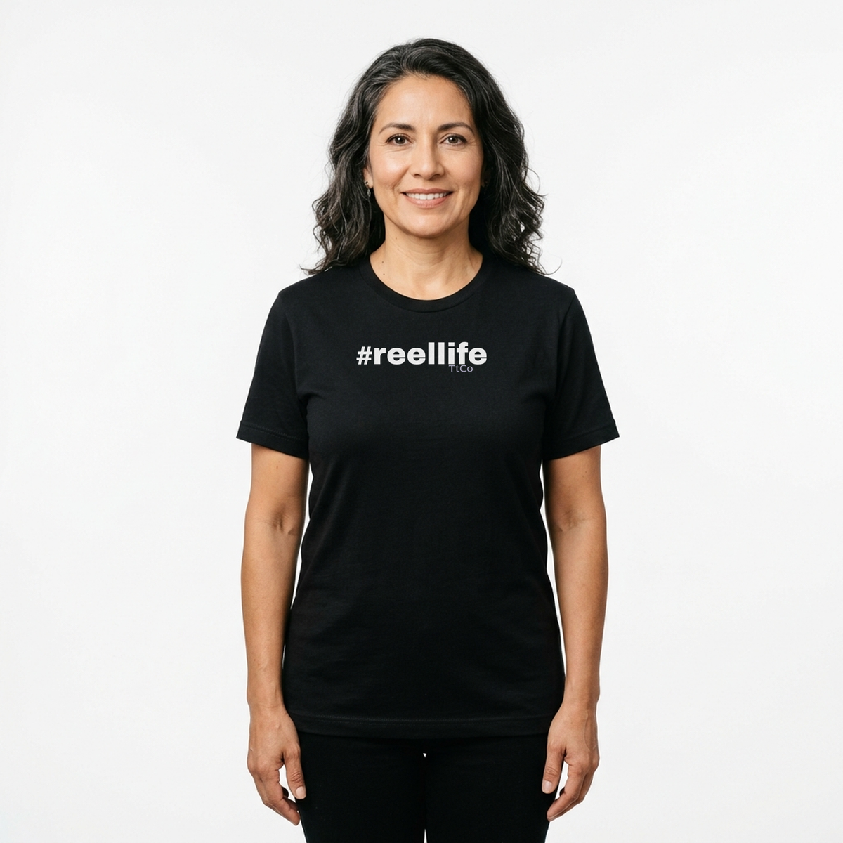 Marina wearing the #ReelLife T-shirt from TtCo with the design centered on the front.