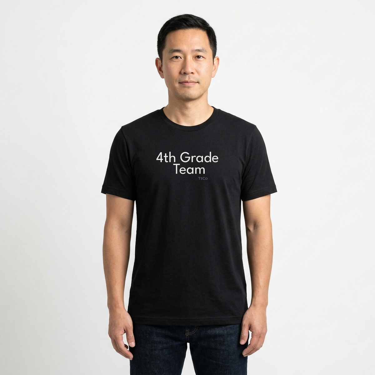 Kenji wearing the 4th Grade Team T-shirt from TtCo with the design centered on the front.