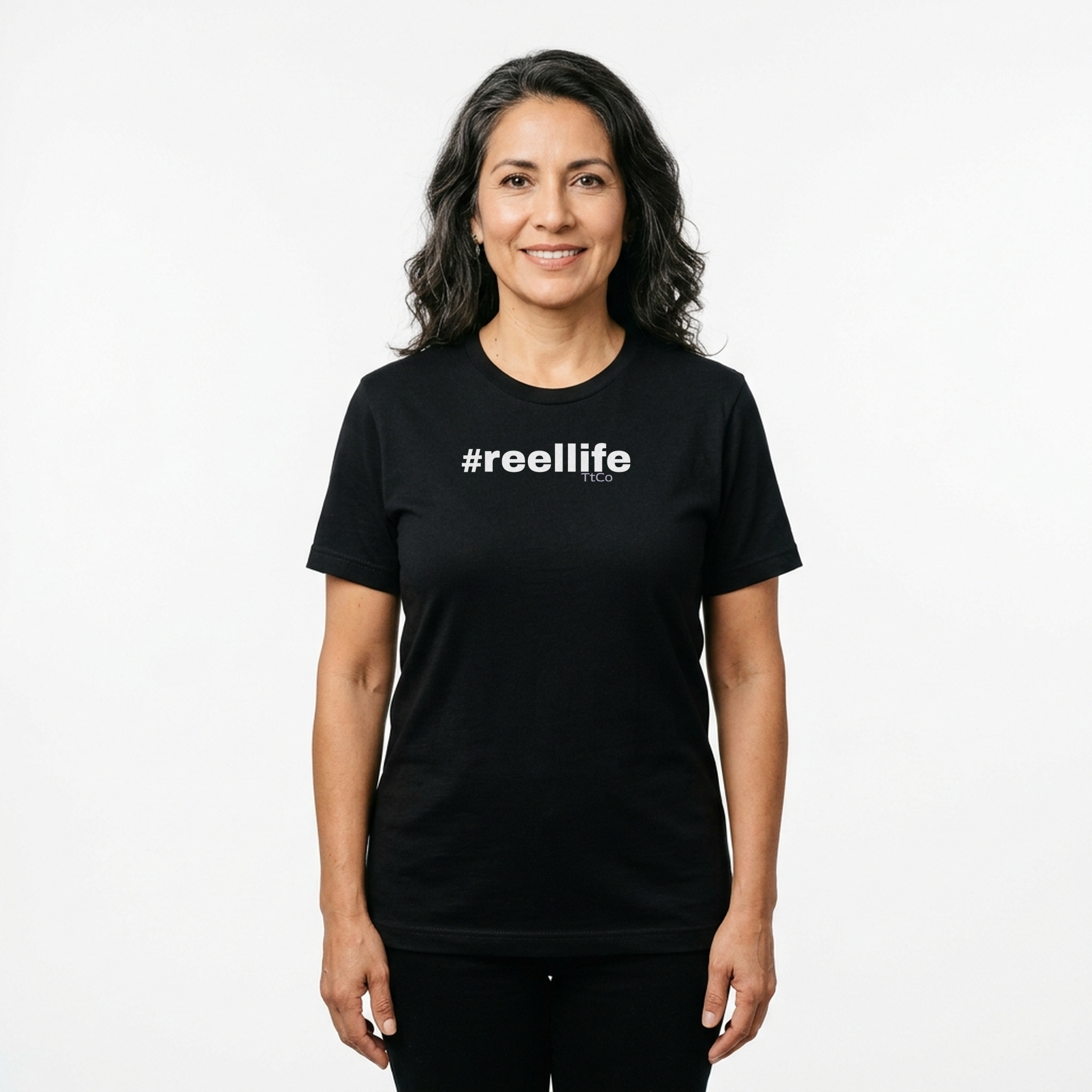 Marina wearing the #ReelLife T-shirt from TtCo with the design centered on the front.